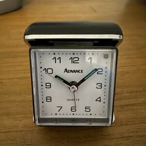 Vintage Advance battery powered Black Gold travel alarm clock Works